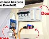 Jak podłączyć dzwonek: moduł ESP8266 i mikrofon przy skrzynce z bezpiecznikami.