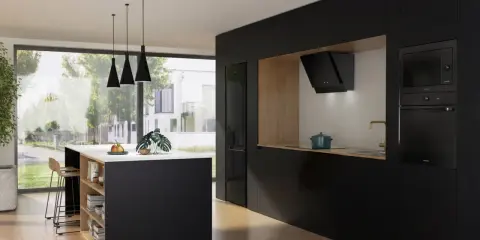 Nowoczesna kuchnia z czarnymi frontami, wyspą i sprzętem Gorenje. Gorenje to firma znana z innowacyjnych rozwiązań AGD.